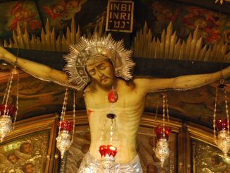 Christus am Kreuz auf Golgota, Grabeskirche, Jerusalem. Léon Bloys "Das Heil durch die Juden" und der Christusmord, das größte Verbrechen der Menschheit.